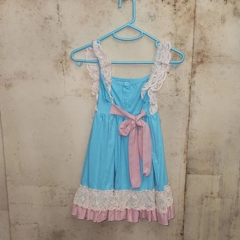 SUNDAY CROSS TOP SZ XXXL RUNS SMALL FITS AS 10/12  ADD LEGGINGS EASTER SPRING